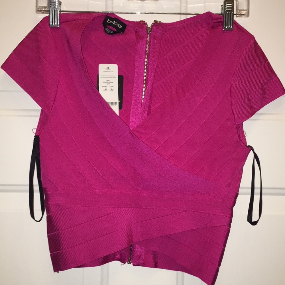 matching pink crop top and mini skirt. Never worn